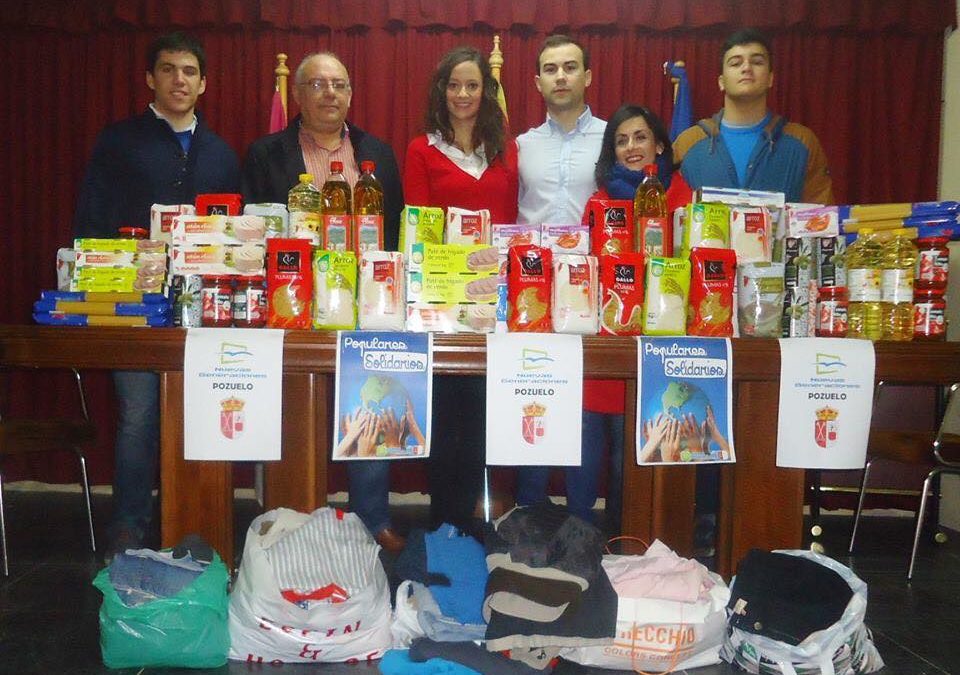 Campaña Populares Solidarios en Pozuelo, recaudando ropa y 48,38 Kg.